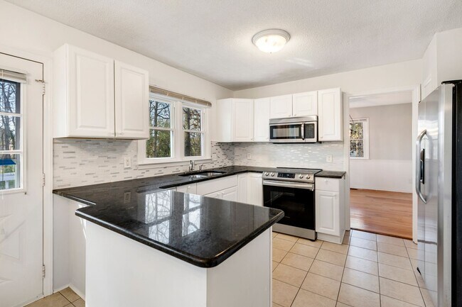 Photo - Just right 3 bedroom, 2 bath ranch with hardwoods and fenced yard!