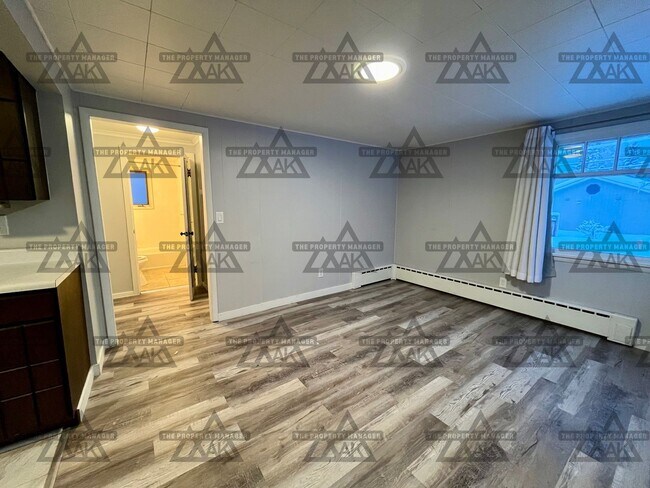 Photo - Dog-Friendly Tri-Level Home on Double Lot with Fenced Yard