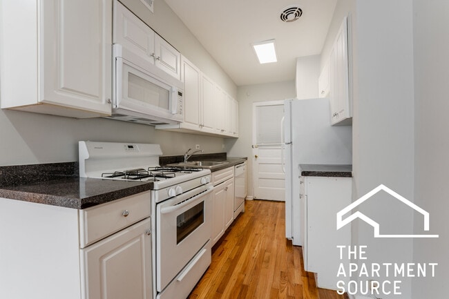 Building Photo - 6535 N Mozart St Unit 1R Rental