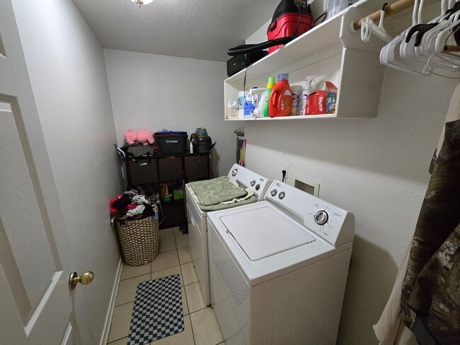 Photo - Bryan - 3 bedroom / 2 bath duplex with fenced in yard.