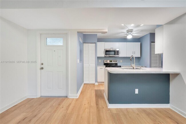 Building Photo - 9912 Hammocks Blvd Unit 104-41