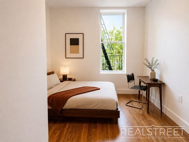 Photo - Modern Two-Bedroom with In-Unit Laundry and G Train Access — Available September 1 Unit 3B