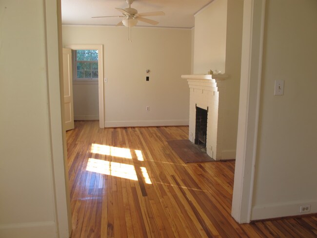 Living room with working firer place - 2201 Lee St Unit 2201 Lee Street