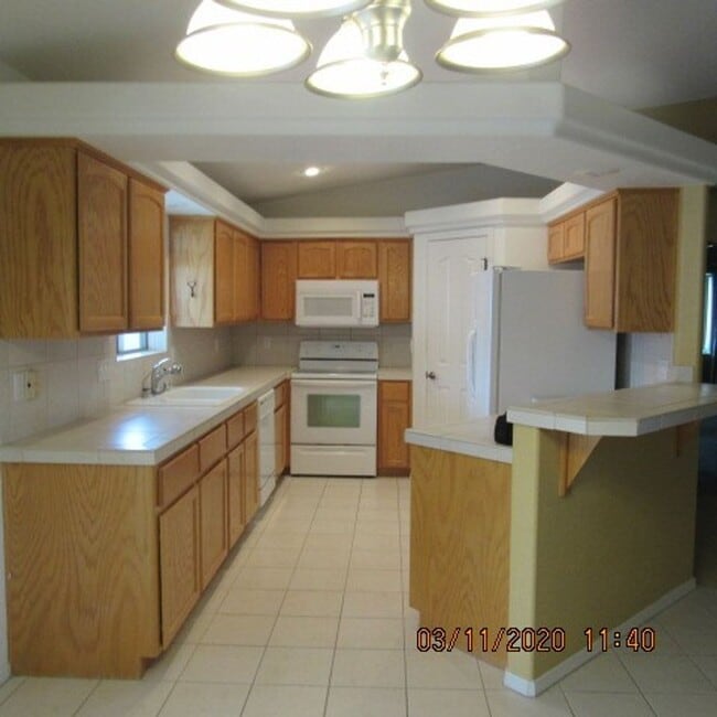 Photo - 3 bedroom 2 bath home with 3 car garage and RV parking