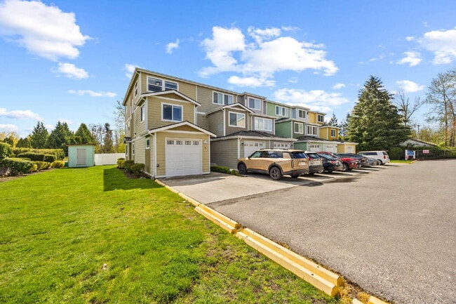 Photo - 4 bedrooms, 2.5 bathrooms with attached garage. This large unit is 3 floors!  Rent of $2900.00 in... Unit 6