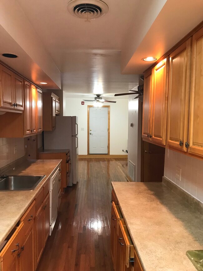 View from kitchen to living room. - 2635 W Girard Ave