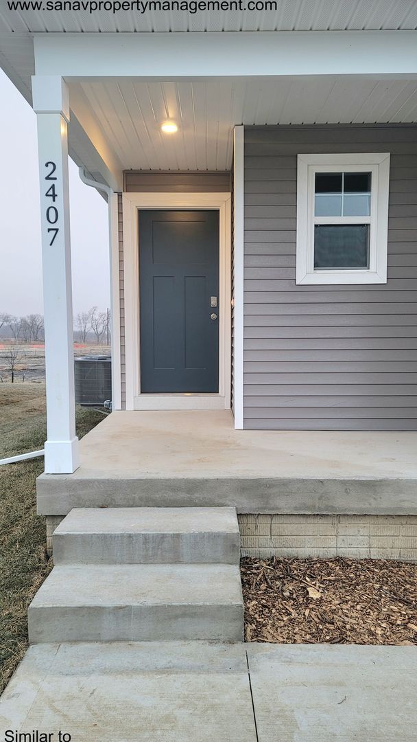 Photo - Single Family Ranch Home with a Finished B...