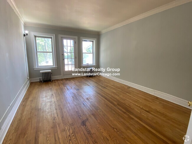 Building Photo - 1053 W Pratt Blvd Rental