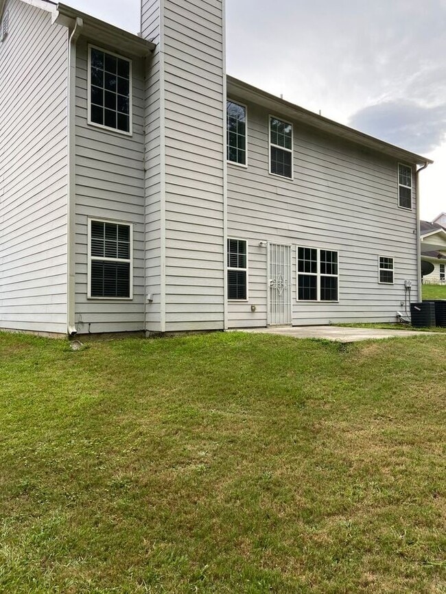 Photo - 4BR Home w/ Fireplace + 2-Car Garage in Snellville