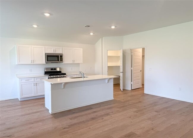 16309 Harvester Dr