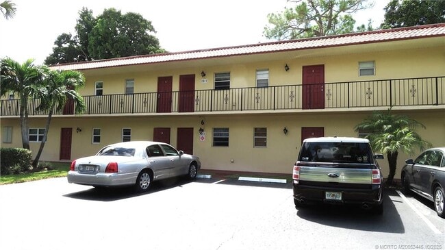 Building Photo - 1911 SW Palm City Rd Unit H