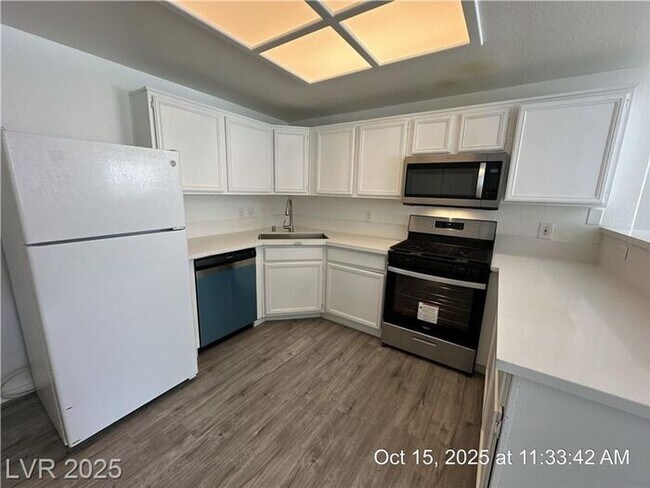 Photo - SPACIOUS FIRST-FLOOR CONDO LOCATED IN A GA...