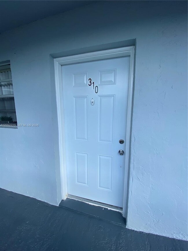 Building Photo - 1755 W 60th St Unit D310