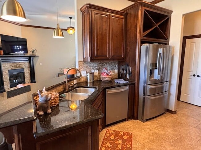 Photo - 3 bed plus office , 3 car garage with storm shelter, shop with electric and covered patio in Moor...