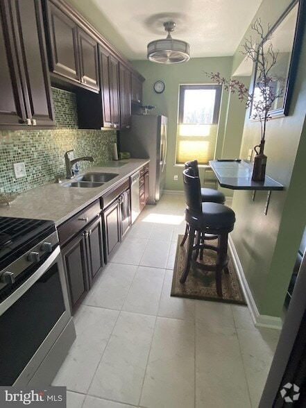 Building Photo - 1001 St Paul St Unit 3F Rental