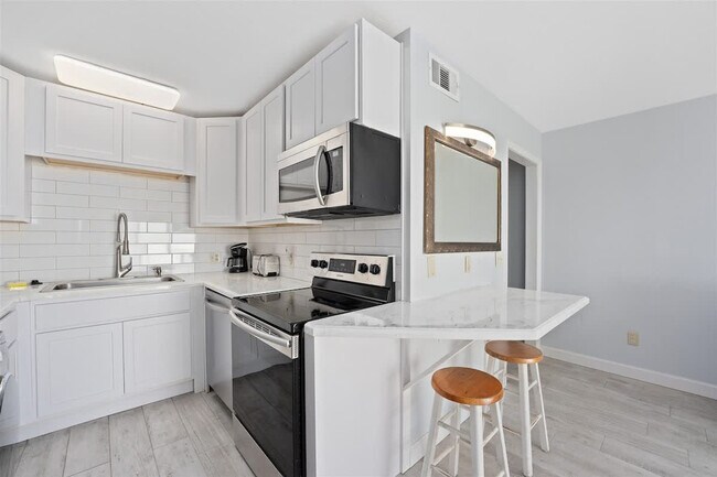 Photo - 8743 Thomas Dr Unit SI FL10-ID1354925P
