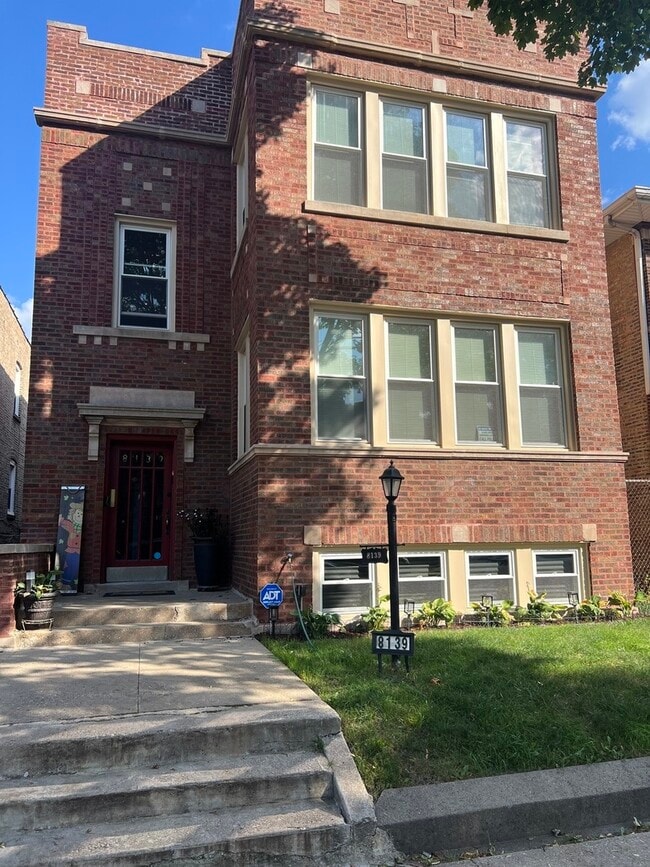 Building Photo - 8139 S Peoria St Unit 2