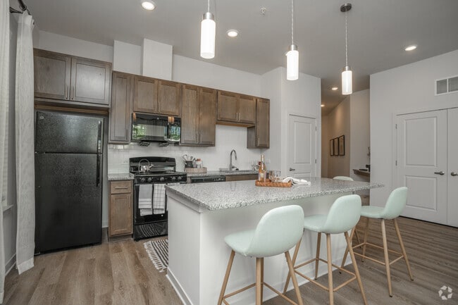 2BR, 2BA - 1,166SF - Kitchen - Veranda at Assembly