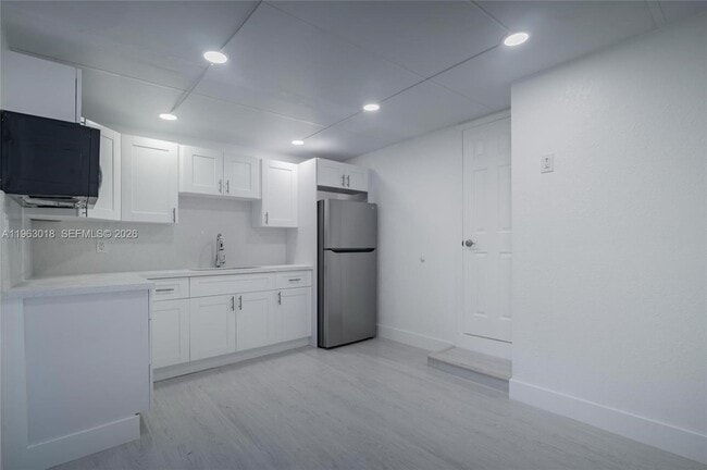 Photo - 595 NW 139th Terrace Unidad 2