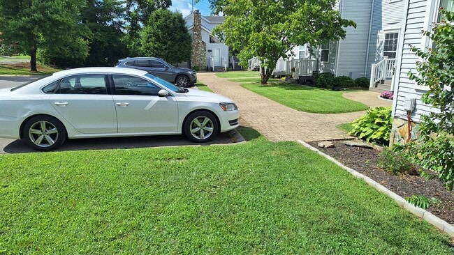 Front entrance (summer) - 217 Walton Ferry Rd Unit 106