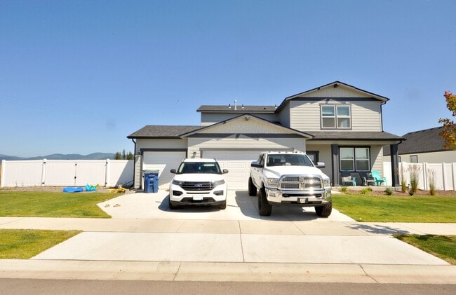 Photo - Practically NEW!! 4 bed 3 bath home, 3 car garage & RV parking