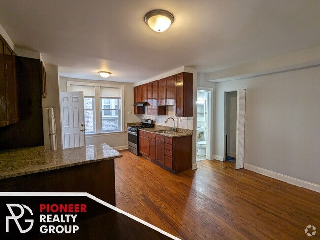 Building Photo - 5029 N Harding Ave Unit 2 Rental