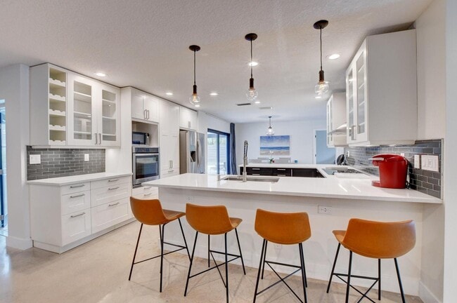 Northwest 12th Way, Boca Raton, FL 33486 - 4 BR 2 BA single-family home