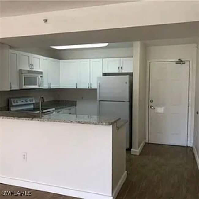 Photo - 8304 Key Royal Cir Unidad 1712 Rental