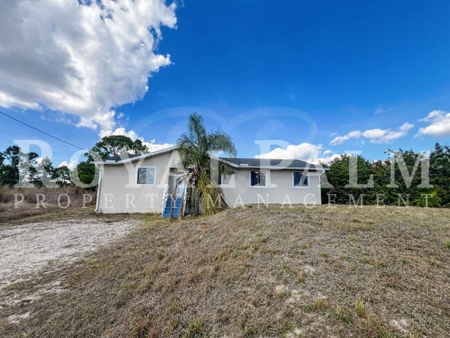 Photo - 4 Bedrooms, 2 Bathrooms & a Huge Backyard — Spacious Lehigh Acres Home with Pet-Friendly Living o...