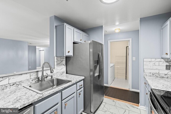 Building Photo - 7516 Snowpea Ct Unit K