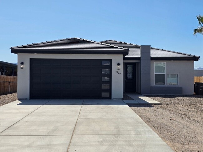 Photo - Beautiful new build-Never been lived in with pull through 3 car garage in Fort Mohave AZ