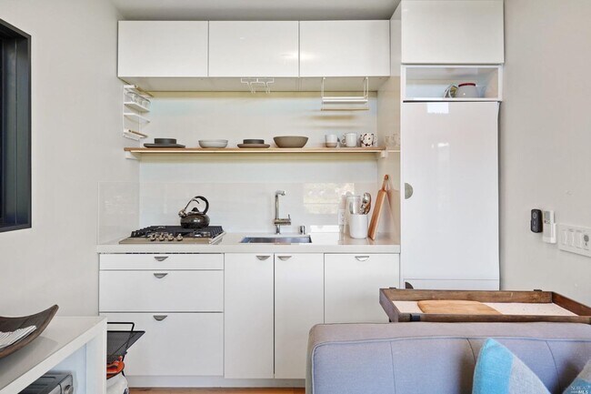Photo - STUNNING STAND ALONE ADU STUDIO UNIT WITH TOP OF THE LINE FINISHES AND GREAT OUTDOOR SPACE