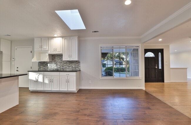 Photo - Bright 4BR Los Altos Retreat with Central A/C, Attached Garage & In-Unit Laundry