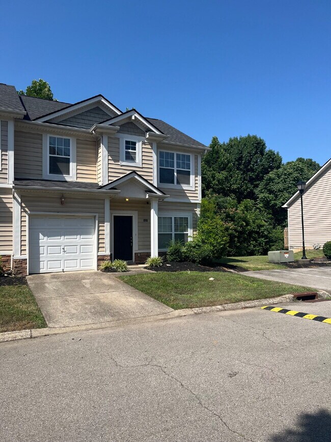 Building Photo - "Spacious 3-Bedroom Townhouse Retreat with Fireplace & Hardwood Floors in Antioch!" Unit 120