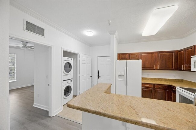 Building Photo - 8020 Tuscany Way Unit 6108