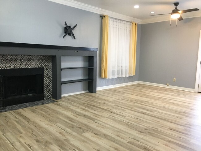 Photo - Midtown 2 story condo. Over 1200 sq ft of living space! Fenced in back yard! Pets are owner's app...