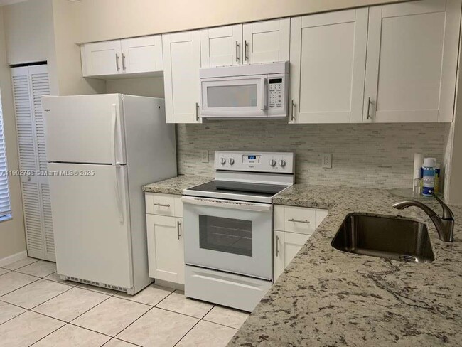 Photo - 21 Fleming Ct Unidad TOWNHOUSE