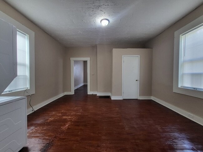 Photo - Cozy, clean, stove, fridge, and washer/dryer