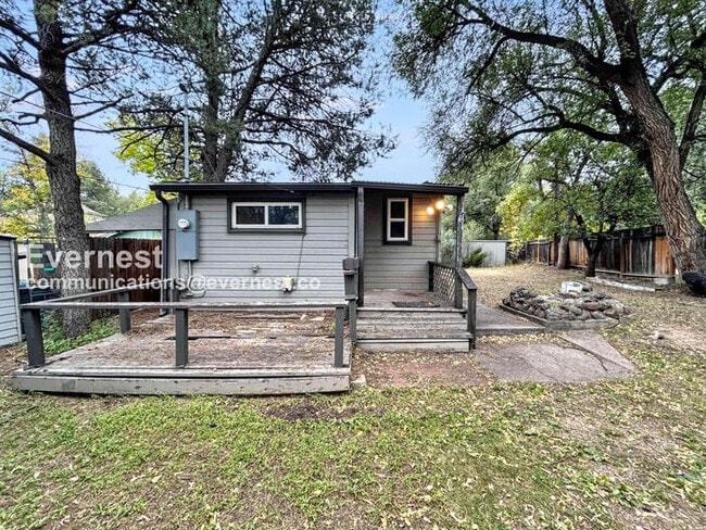 Building Photo - 110 1/2 W Cheyenne Rd Unit back