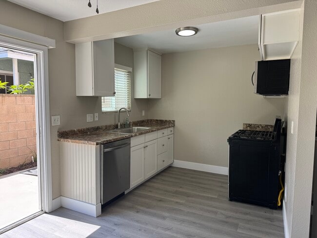 Kitchen with Appliances - 10676 Walnut St Unit 10676