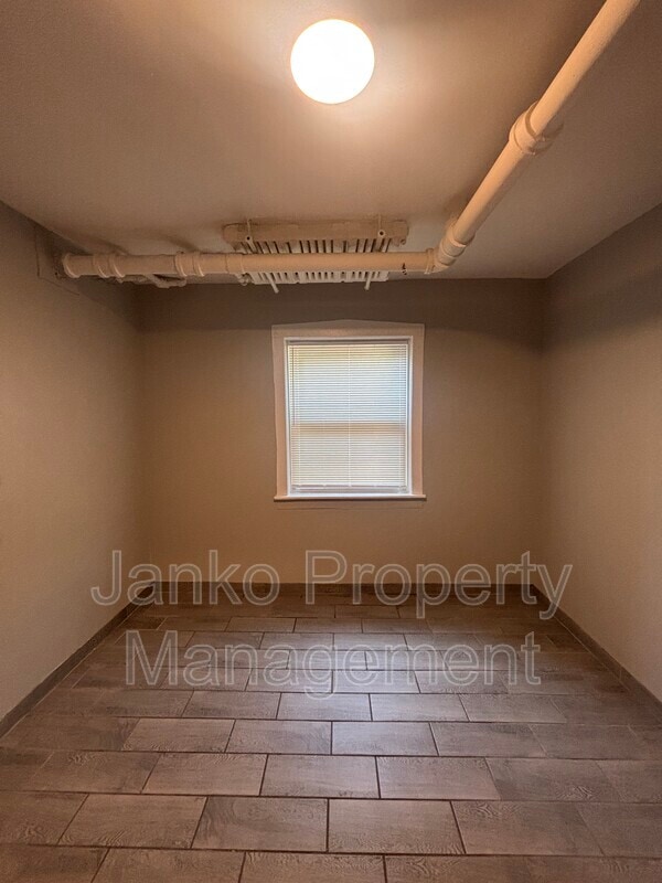 Photo - 6059 S Troy St Condo Unit Garden