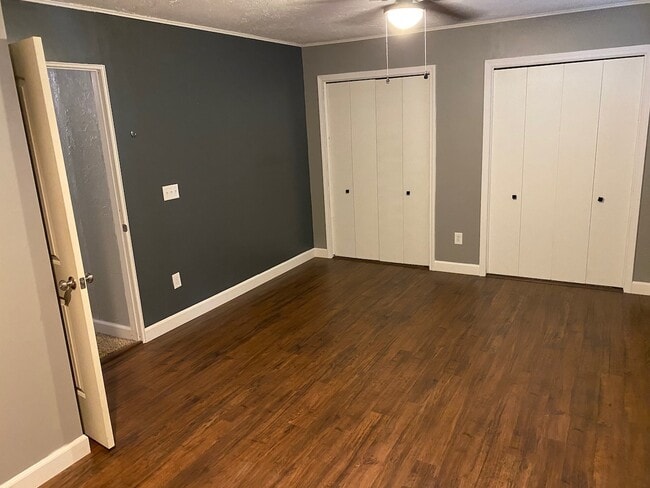 Master Bedroom has double closets and solid surface floors.