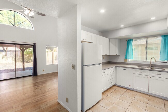 Kitchen open to living area - 3748 W Carol Ann Way House