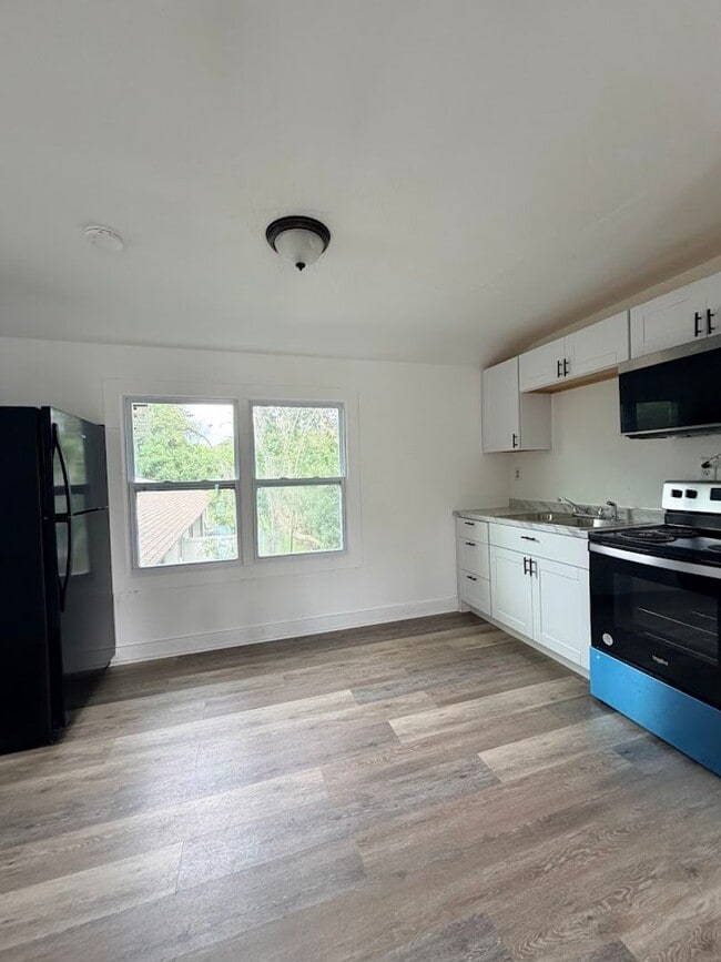 Photo - Completely remodeled upstairs loft apartment with garage below