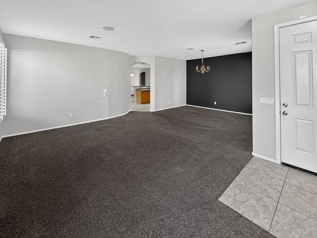 Photo - Single-level 4 bed, 2 bath home with tandem 3-car garage and RV gate.