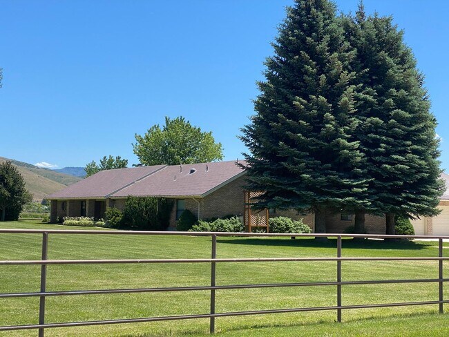 Photo - Beautiful home single level entry with out buildings and amazing landscaping - shorter term lease...