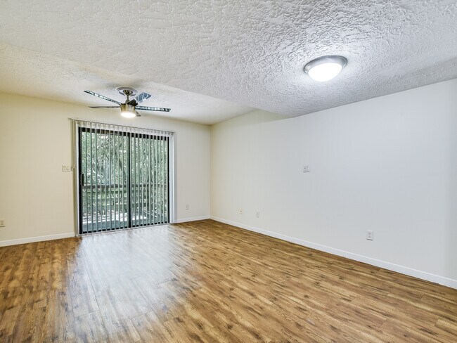 Open-concept living and dining area—perfect for a shared meal or a dedicated multi-desk study zone.
