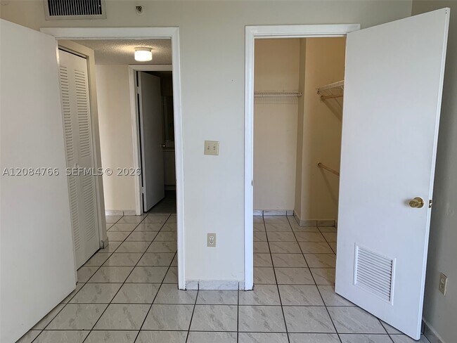 Building Photo - 9688 Fontainebleau Blvd Unit 406