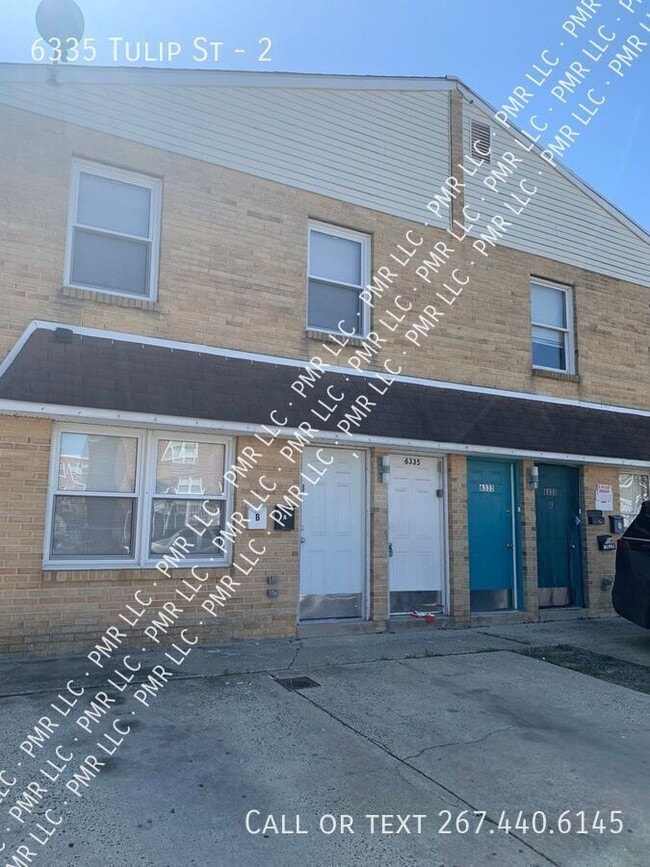 Building Photo - 6335 Tulip St Unit 2