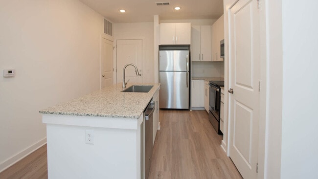 Kitchen with Stainless Steel Appliances - The Penman